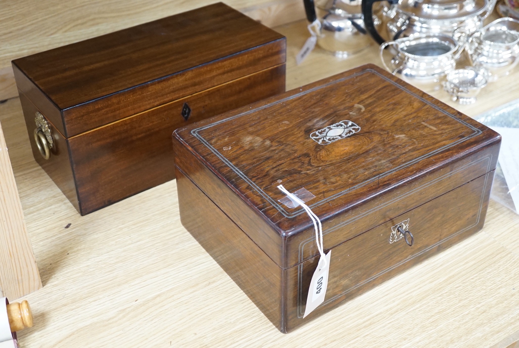 A George IV mahogany tea caddy and a Victorian rosewood and mother of pearl inlaid workbox-30cms wide x 14cms high